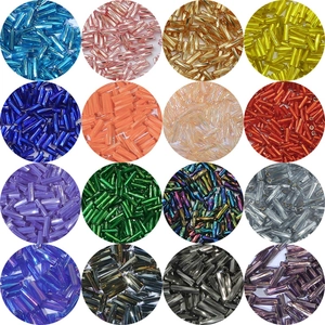 Macro display of 16 colorful glass tube beads for DIY jewelry and sewing projects