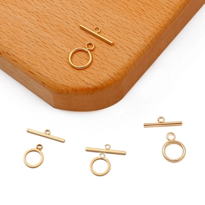 9mm 18K gold plated OT toggle clasp set for DIY jewelry making on wooden background