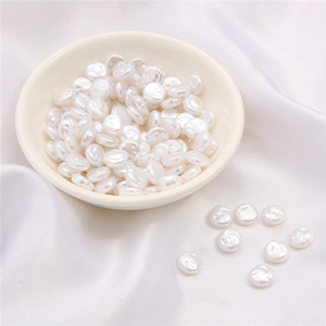 Irregular white ABS imitation pearls on white silk for DIY jewelry making and craft projects