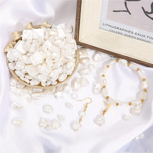 Baroque style ABS imitation pearl jewelry set with bracelet and earrings on white silk