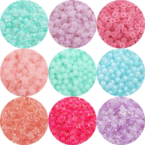 Mix of acrylic star and tulip beads in pastel colors for DIY hair accessories