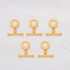 Detail showing five pairs of 18K gold plated toggle clasps for jewelry making