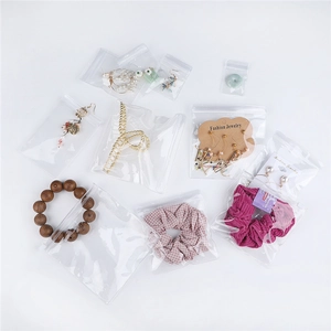 Detailed view of clear PVC jewelry zip bags showing high transparency and seal