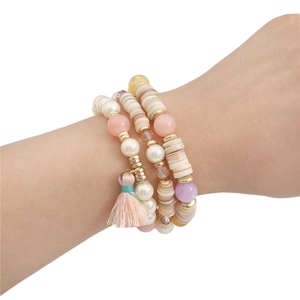 Bohemian multi-layer beaded bracelet with shell discs and pink tassel for women