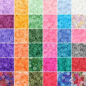 Macro shot of colorful matte frosted beads in 36 shades for DIY jewelry making