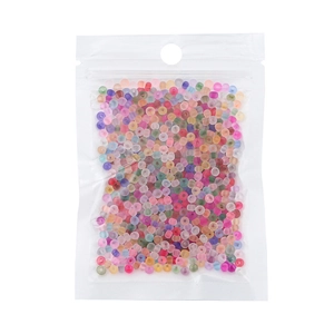 Colorful matte rainbow seed beads set in transparent packaging for DIY jewelry making