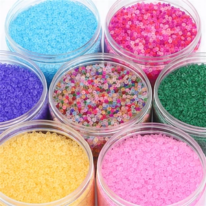 Frosted colorful glass seed beads set in jars for DIY necklace and bracelet jewelry making