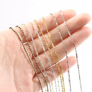 DIY metal bead and barrel chain in four metallic finishes shown on a palm for scale