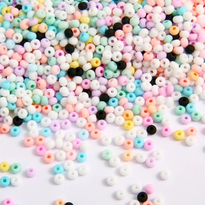 Assorted matte macaron seed beads in pastel colors for DIY jewelry making and crafts