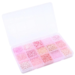 15-grid DIY jewelry kit with pink and white glass beads in a clear storage box