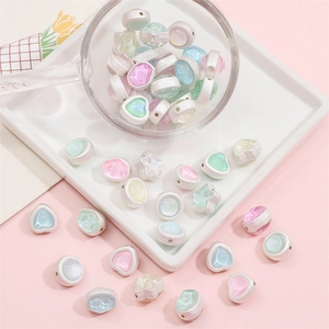DIY iridescent pastel heart and star jewelry beads with white edge detail for crafting