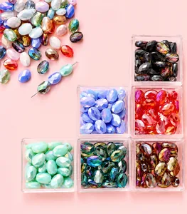 Macro shot of faceted oval crystal beads in various colors for DIY jewelry making