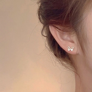 Élégantes boucles d'oreilles nœud en argent S925 doré avec pierres de zircon brillantes