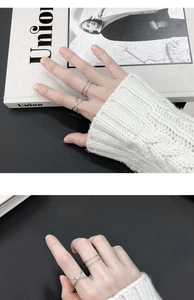 Gros plan de bagues minimalistes en argent sterling S925 à double couche et lignes croisées