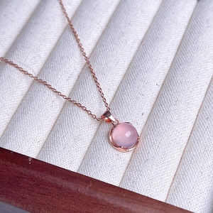 Elegant S925 sterling silver necklace with a round pink chalcedony pendant in rose gold