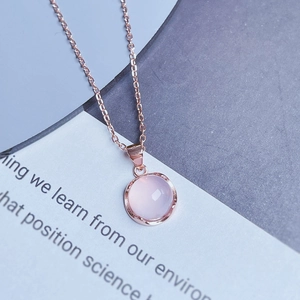 Elegant rose gold S925 silver necklace with a round pink chalcedony gemstone pendant