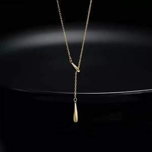 Élégant collier en Y argent S925 avec pendentif goutte d'eau dorée et long gland