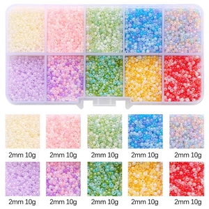 Detail of 10-color 2mm seed bead set in clear plastic box for DIY jewelry making