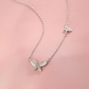 S925 sterling silver cat eye stone butterfly necklace with cubic zirconia accent on pink silk