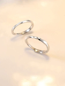 Detail of S925 sterling silver Mobius rings featuring frosted texture and open design