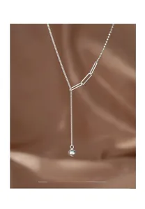 Detail of S925 sterling silver Y-shaped tassel necklace with polished round silver bead