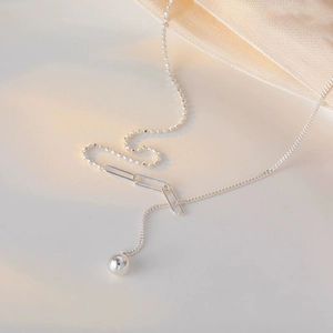 Minimalist S925 sterling silver ball tassel necklace featuring paperclip link detail
