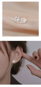 Detail of S925 sterling silver flower stud earrings featuring shimmering zircon petals