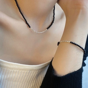 Close-up of S925 sterling silver crushed beads and black agate minimalist jewelry set