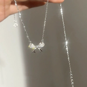 Collana a fiocco in argento sterling S925 con cristalli di zircone scintillanti