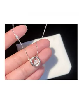 Macro detail of S925 sterling silver Mobius necklace featuring a dancing cubic zirconia stone