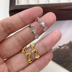 Boucles d'oreilles pendantes triple cœur en argent S925, finitions argentées et dorées