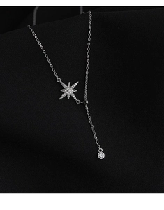Close-up of S925 silver Y-shaped necklace with shimmering star pendant and zircon stones
