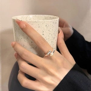 Elegant S925 sterling silver ring featuring a lustrous white pearl on an open adjustable band
