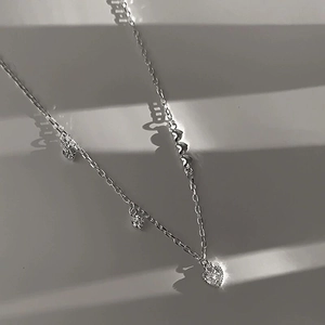 Close-up of S925 sterling silver heart bracelet with sparkling zircon accents