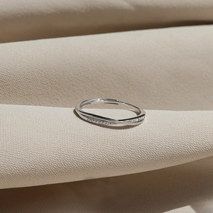 Minimalist S925 sterling silver criss-cross ring with pavé stones and adjustable opening