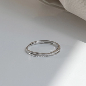 Minimalist S925 sterling silver crisscross ring with pavé zircons and an adjustable open design
