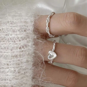 Minimalist S925 sterling silver twist rings set featuring a heart charm for women
