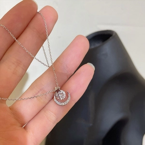 Elegant S925 sterling silver moon and star necklace featuring a sparkling zircon pendant