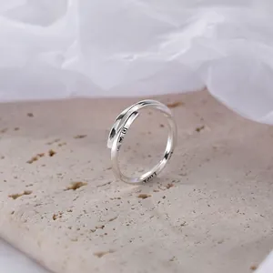 Minimalist S925 sterling silver Mobius ring with LUCK engraving on beige stone