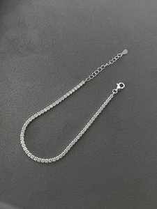 Detail view of S925 sterling silver tennis bracelet with cubic zirconia and lobster clasp