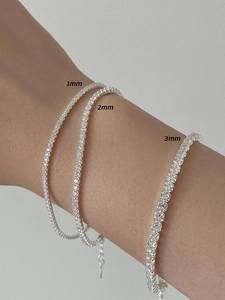 Detailed comparison of 1mm, 2mm, and 3mm S925 sterling silver tennis bracelets on wrist