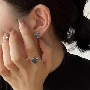 Elegant S925 sterling silver set featuring oval aquamarine stud earrings and matching ring