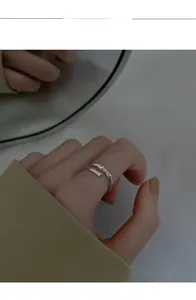 Detail showing the unique crumpled silver paper texture on the S925 sterling silver ring
