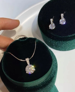 Sparkling S925 sterling silver solitaire diamond necklace and earring set in velvet boxes