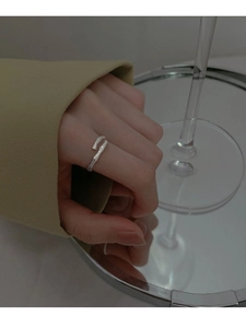 Detail of S925 sterling silver open ring with natural bamboo branch texture on model hand
