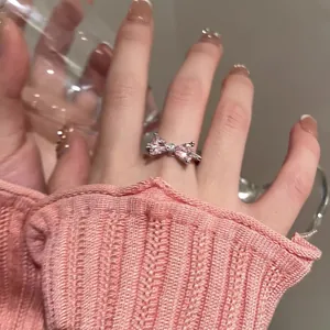S925 sterling silver bow ring with pink crystal accents for women in a sweet style