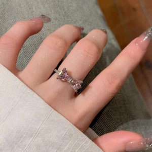 S925 sterling silver bow ring with pink heart stones and sparkling pavé zircon accents