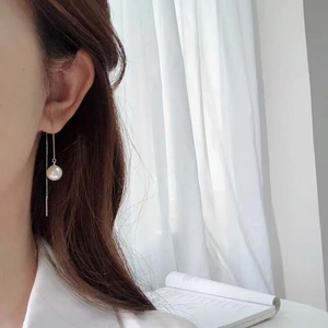 Elegant S925 sterling silver long thread earrings featuring minimalist white pearls