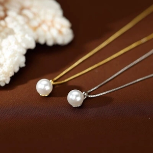 Collana minimalista in argento sterling S925 e oro con ciondolo di perla elegante