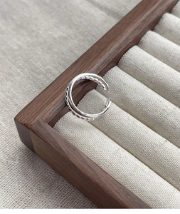 Detail of S925 sterling silver double-layer ring with delicate micro-bead chain texture